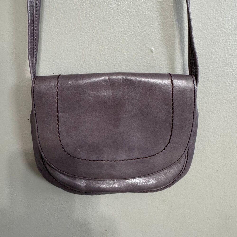 Hobo International leather crossbody bag in a light gray/lilac color